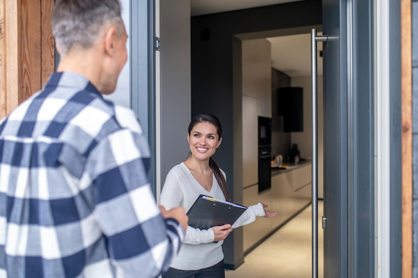 realtor showing a house