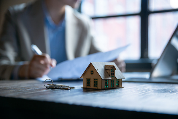 person filling out loan paperwork